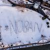 Protesters Form Human Hashtag Against Trump's Travel Ban